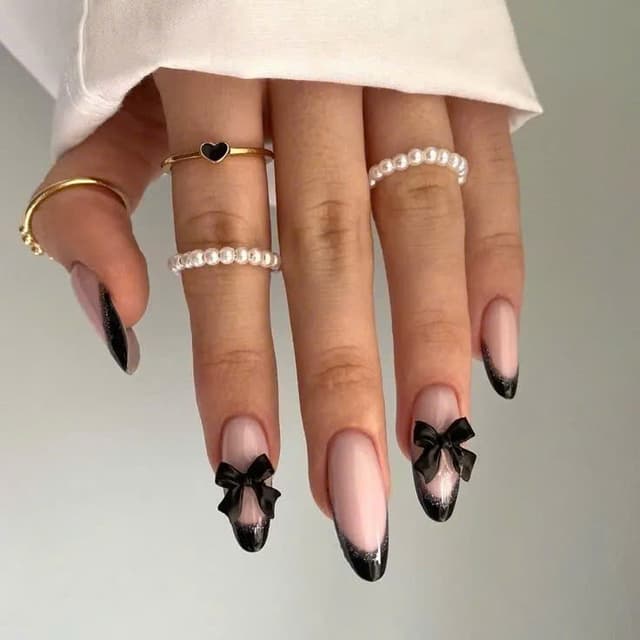 Black bow tip nails